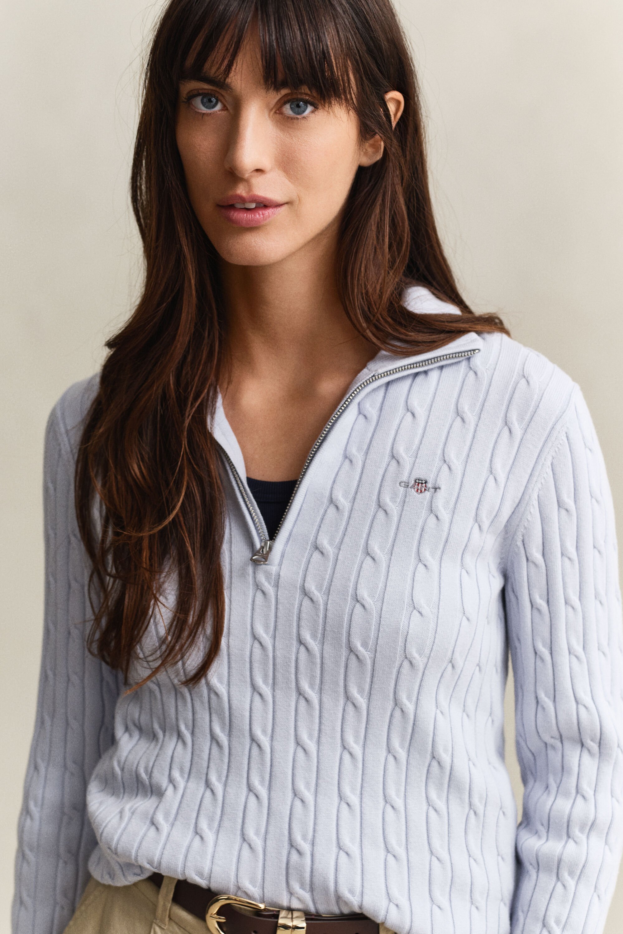 Camisola em malha entrançada com meio fecho de correr