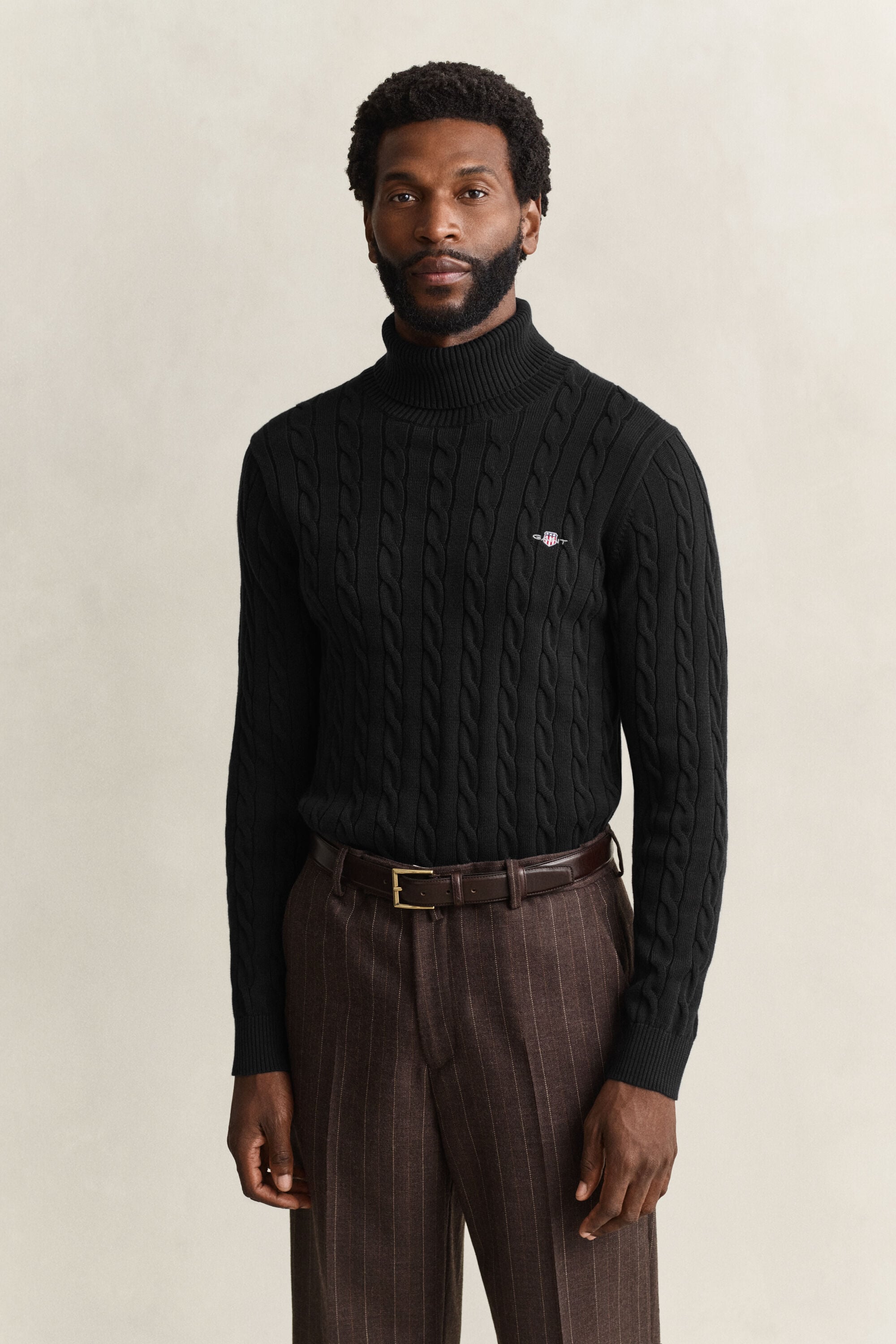 Camisola de gola alta em malha entrançada de algodão