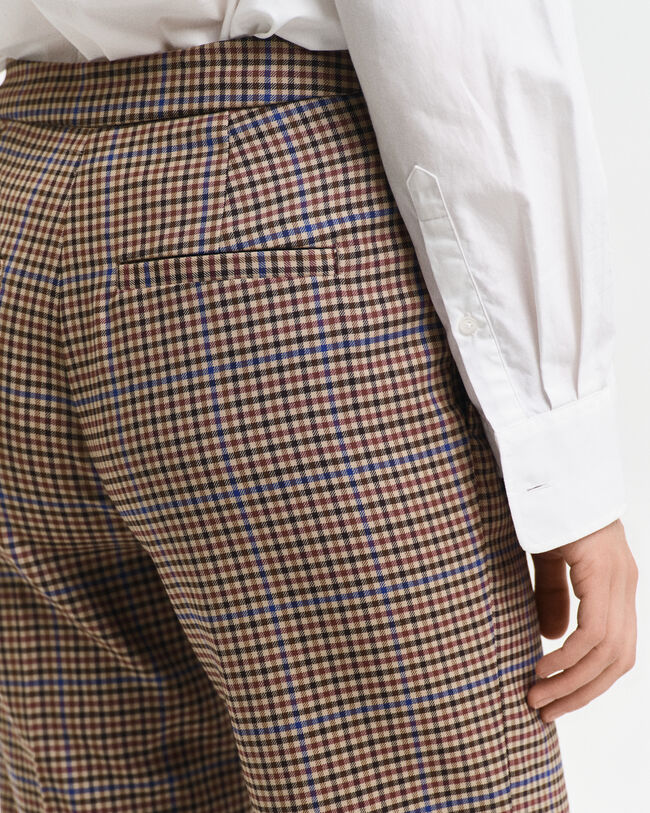 Calças pelo tornozelo