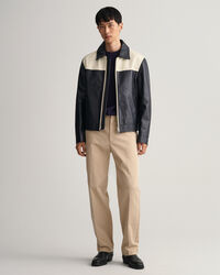 Blus&atilde;o em pele curto