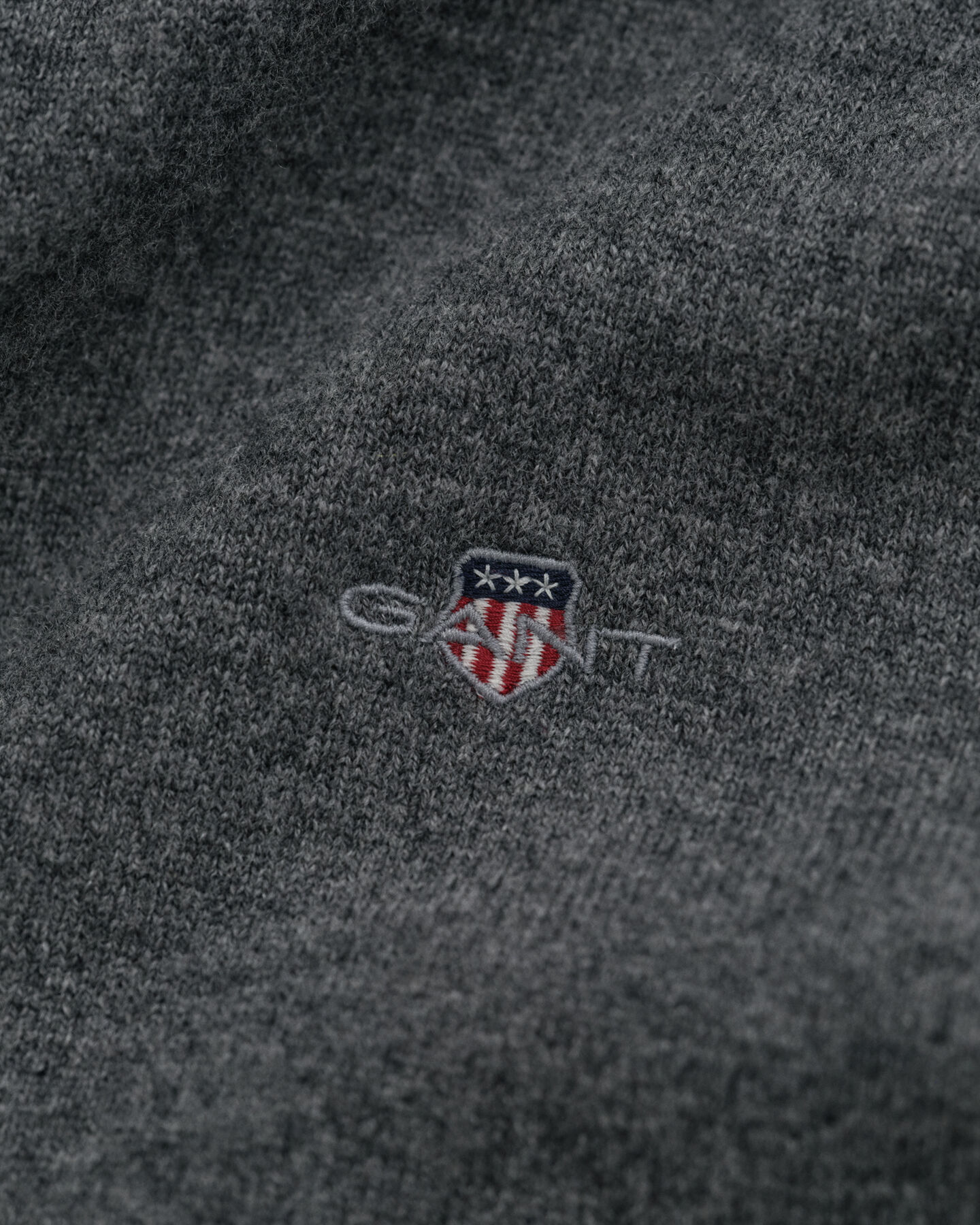 Casaco de malha com fecho em lã extrafina