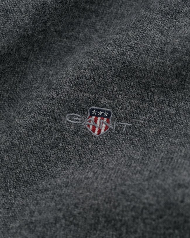 Casaco de malha com fecho em lã extrafina