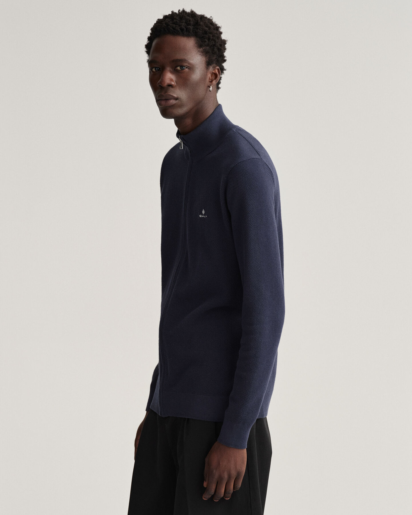 Casaco de malha com meio fecho de correr em algodão piqué