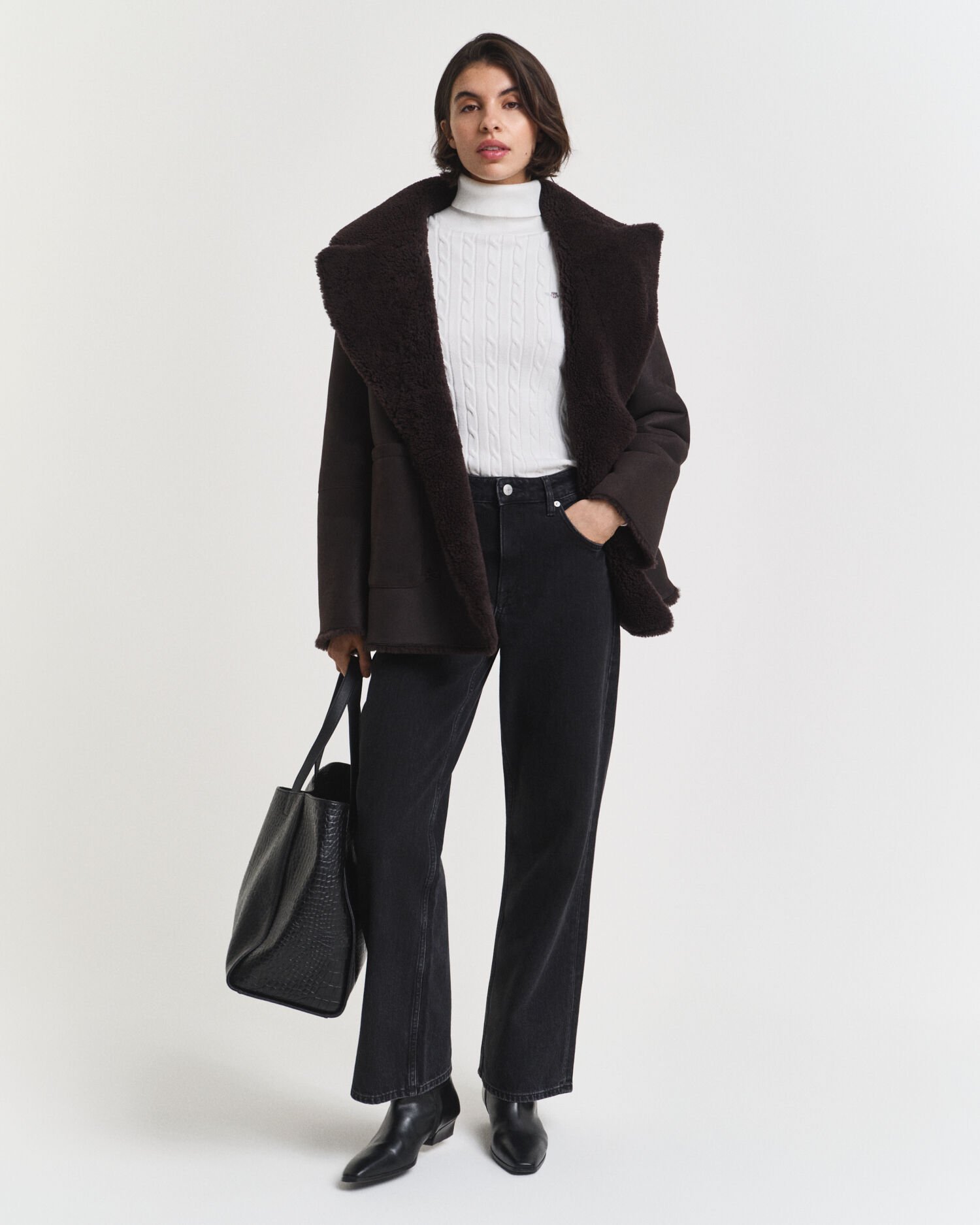 Camisola de gola alta em malha entrançada de algodão com elastano