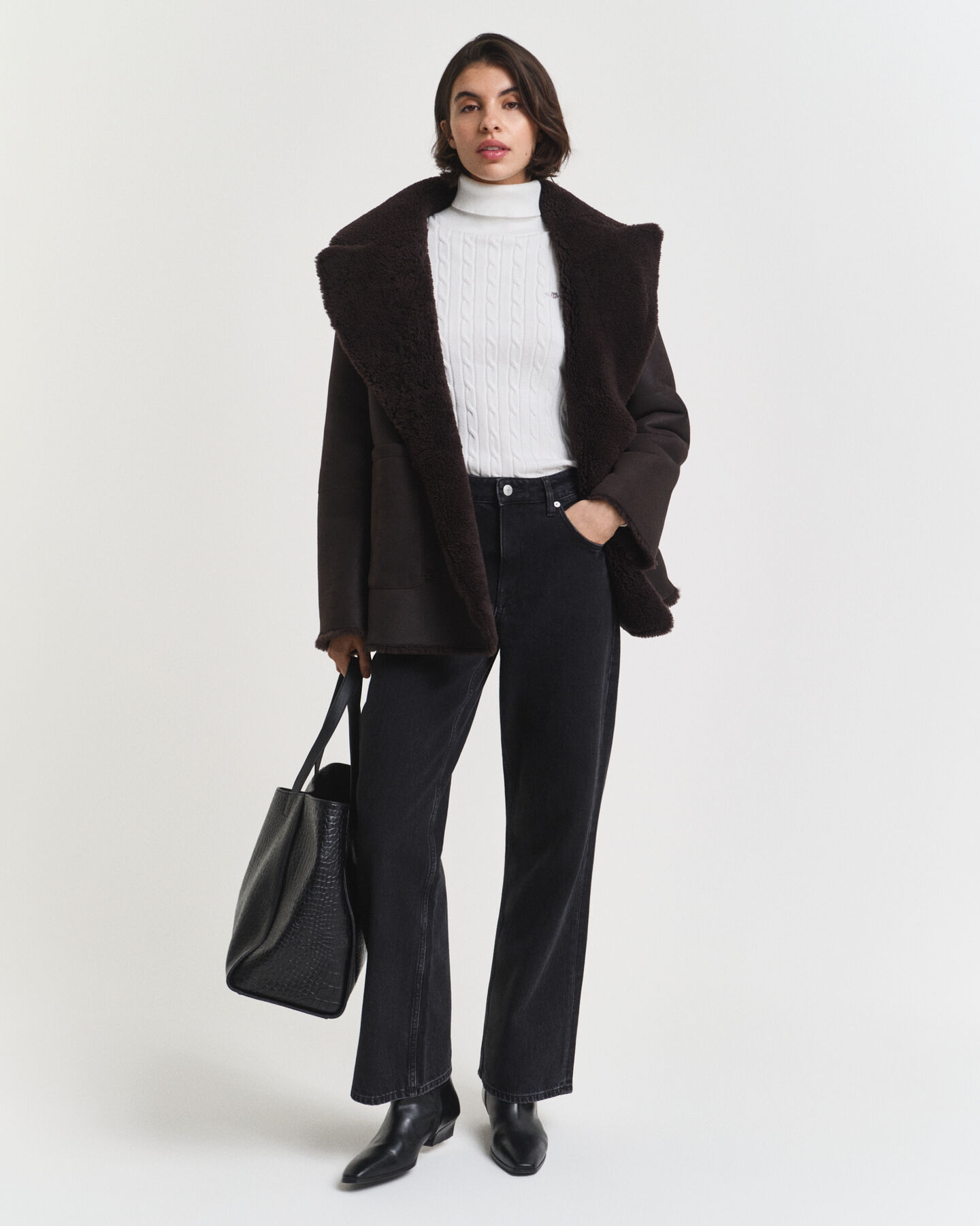 Camisola de gola alta em malha entrançada de algodão com elastano