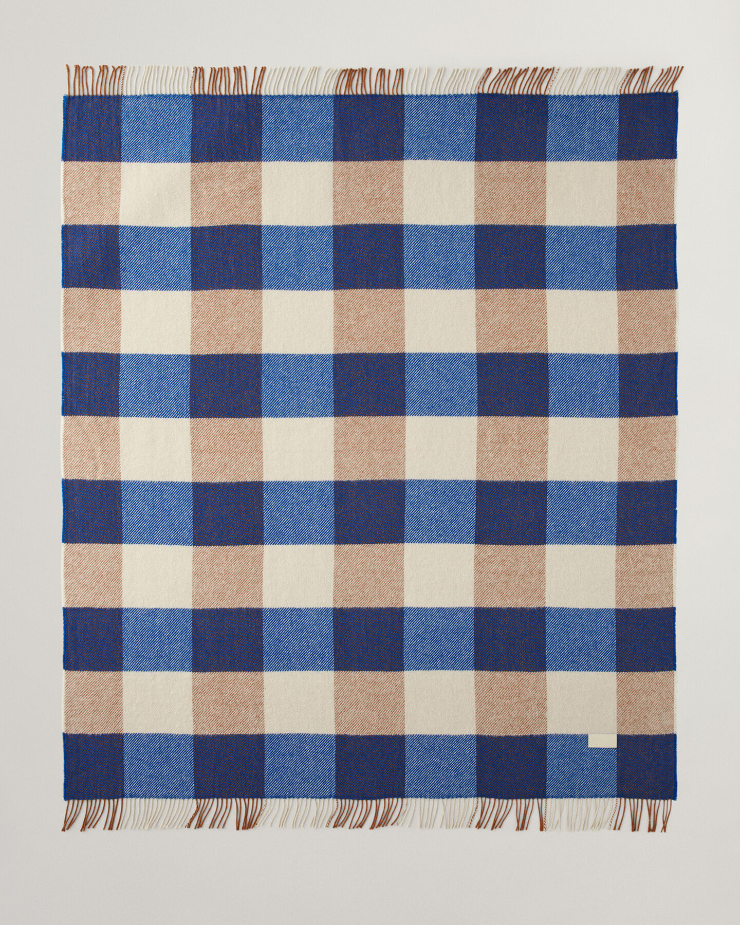 Manta decorativa com padrão de xadrez