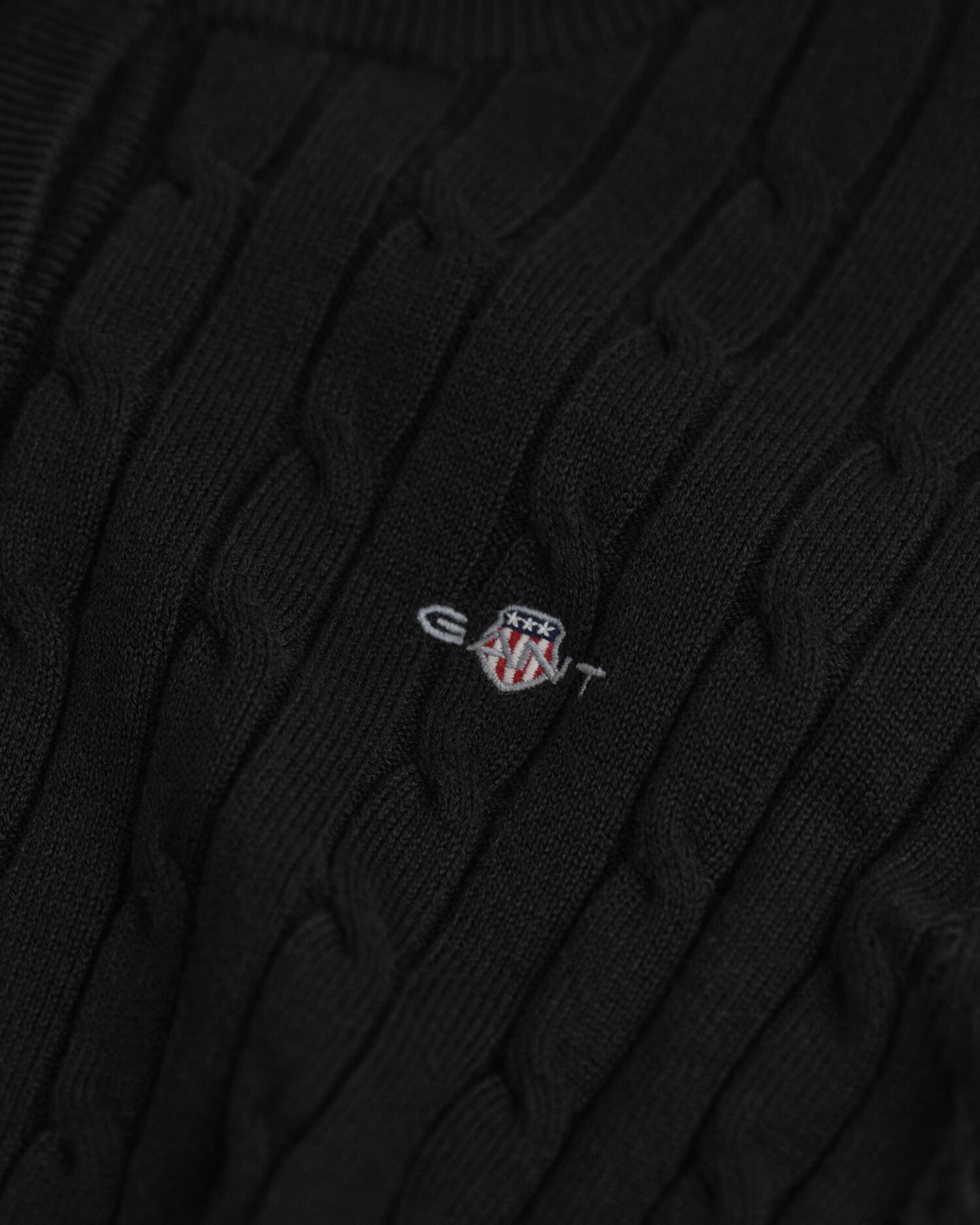 Casaco de malha entrançada