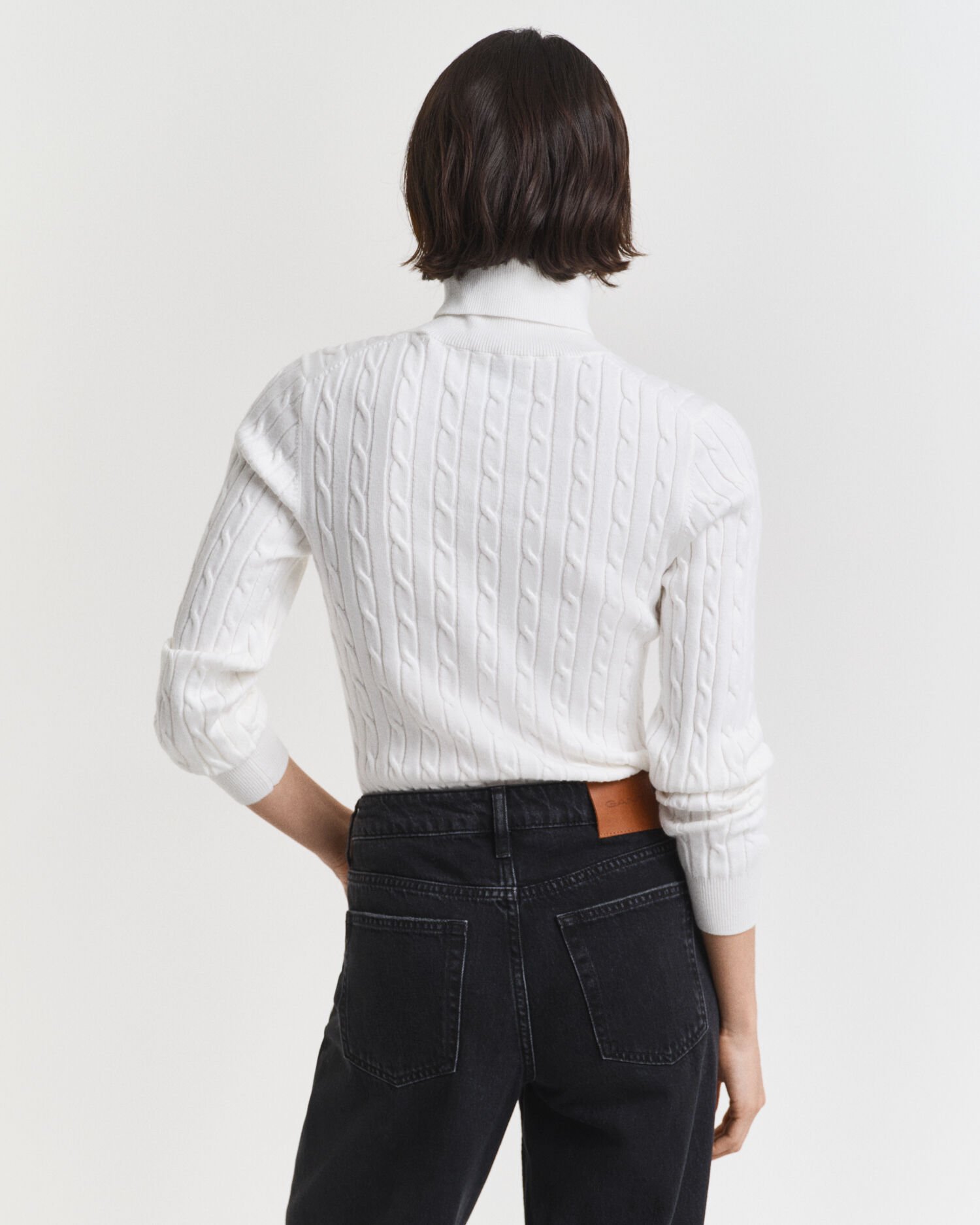 Camisola de gola alta em malha entrançada de algodão com elastano