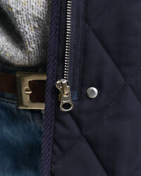 Colete acolchoado com detalhes em bombazina