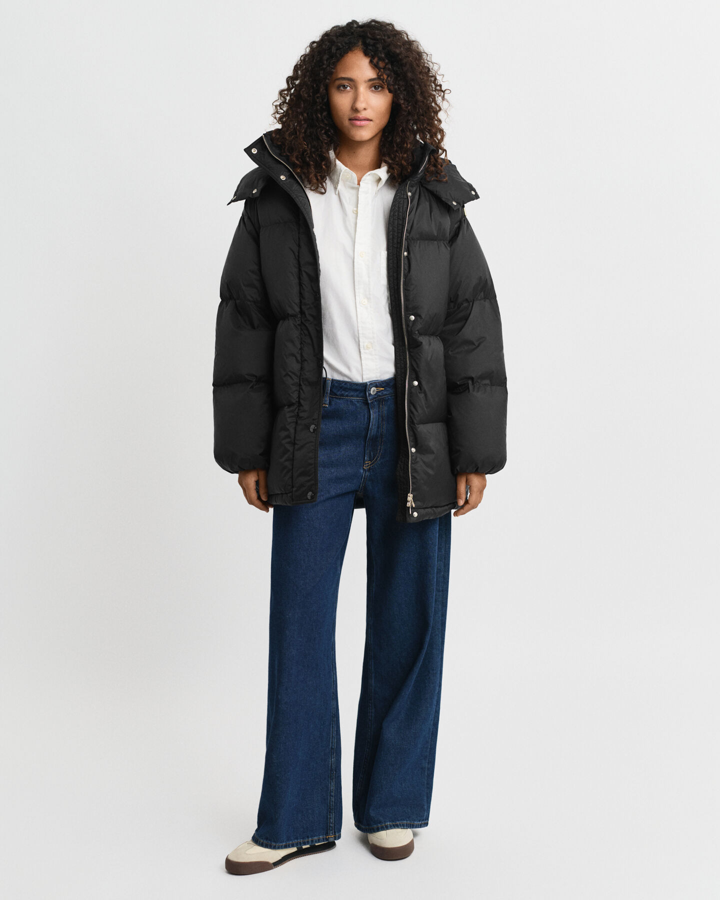 Blusão de penas com comprimento médio