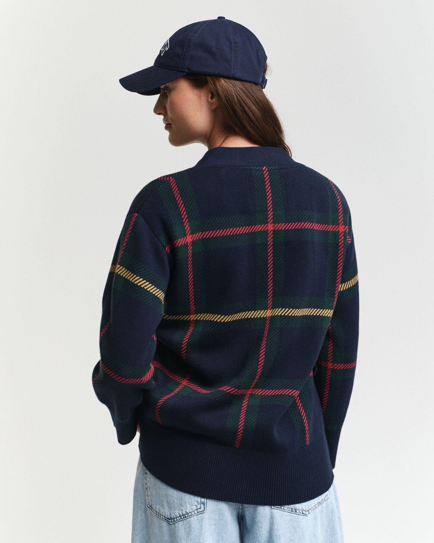 Casaco de malha com decote em V e padrão de xadrez