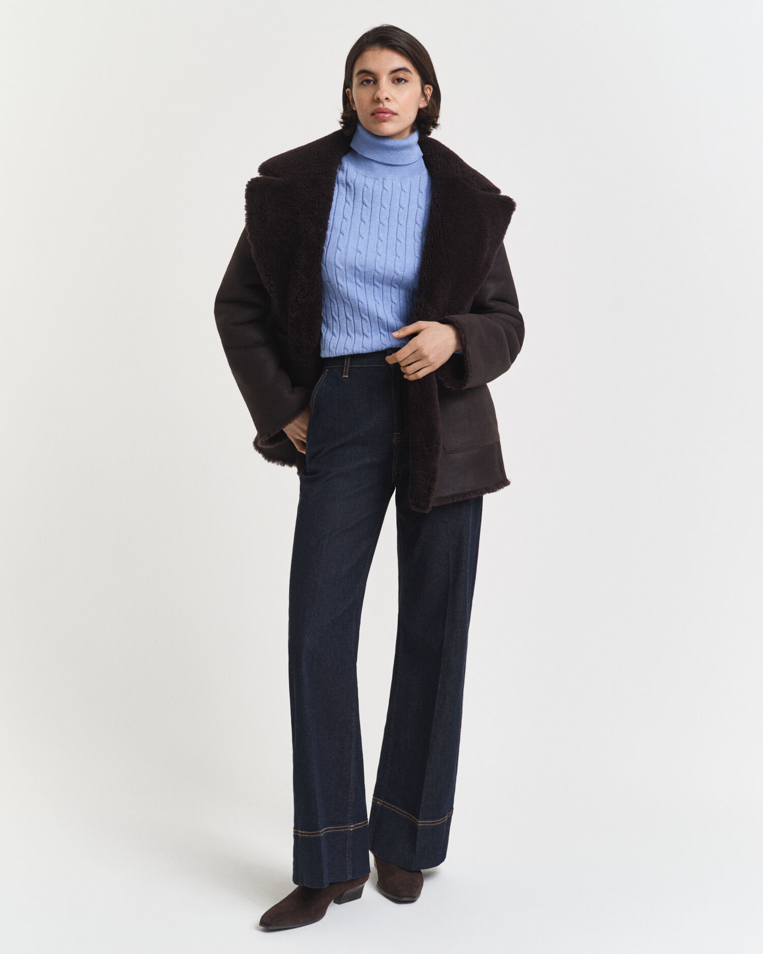 Camisola de gola alta em malha entrançada de algodão com elastano