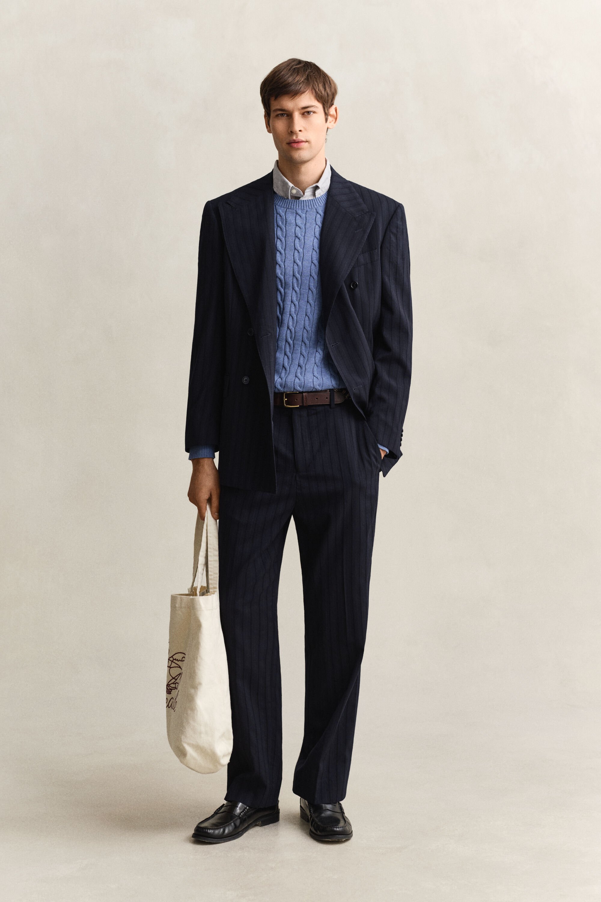 Camisola em malha entrançada de algodão com decote redondo