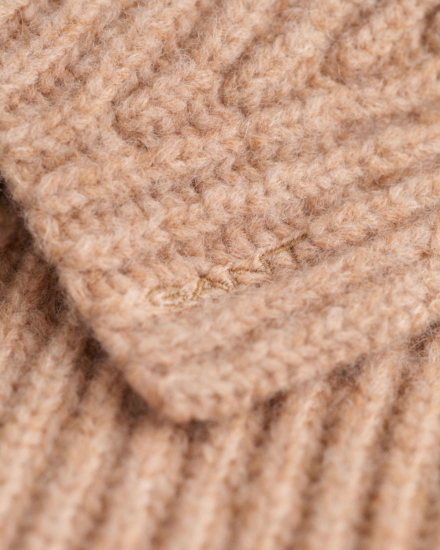 Peitilho em malha canelada