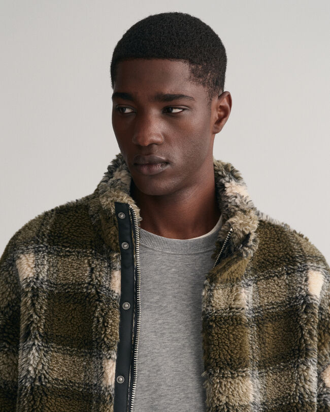 Polar com fecho de correr axadrezado