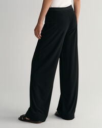 Cal&ccedil;as em jersey com perna larga