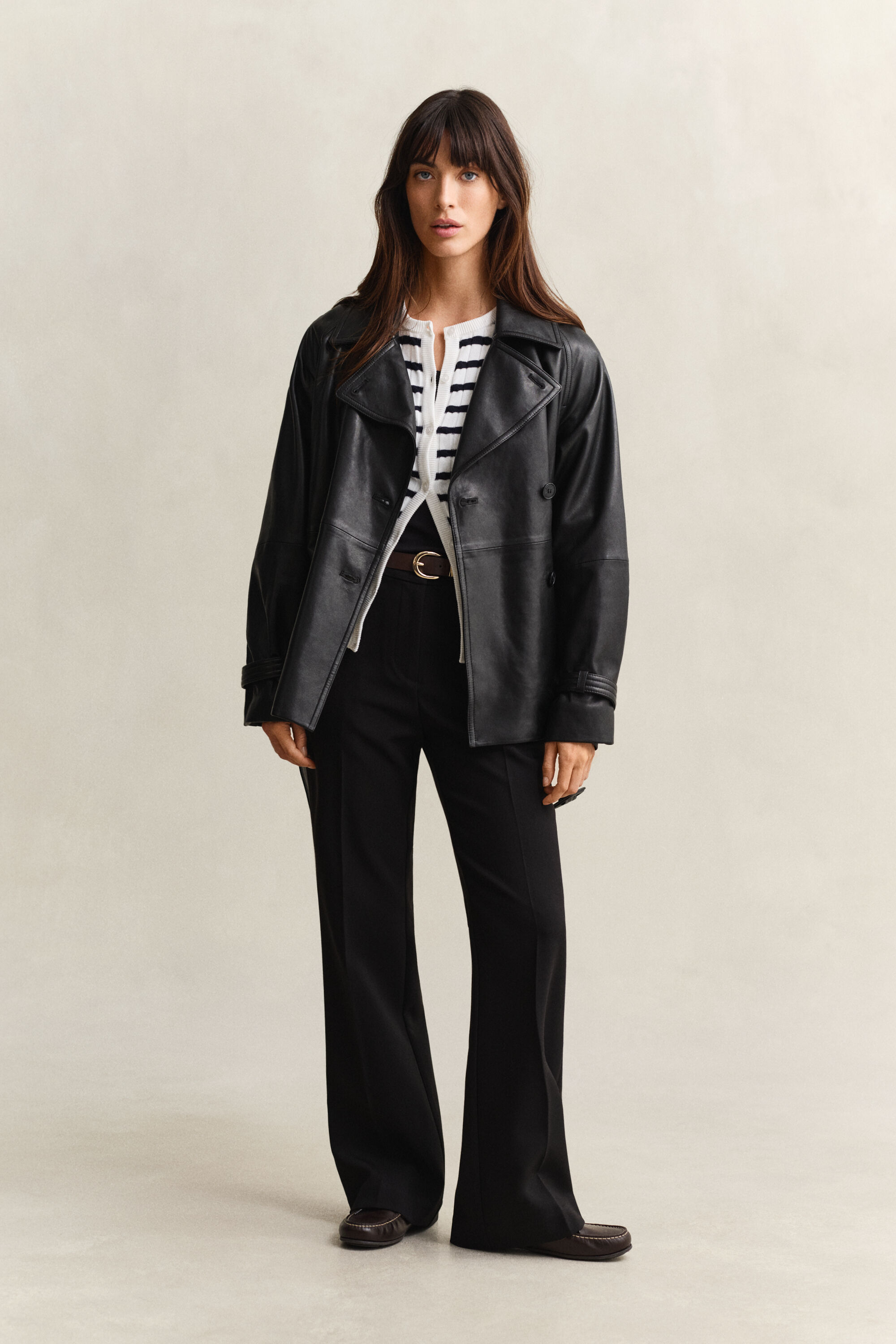 Casaco de malha entrançada às riscas