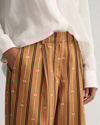 Cal&ccedil;as &agrave;s riscas Monogram relaxed fit