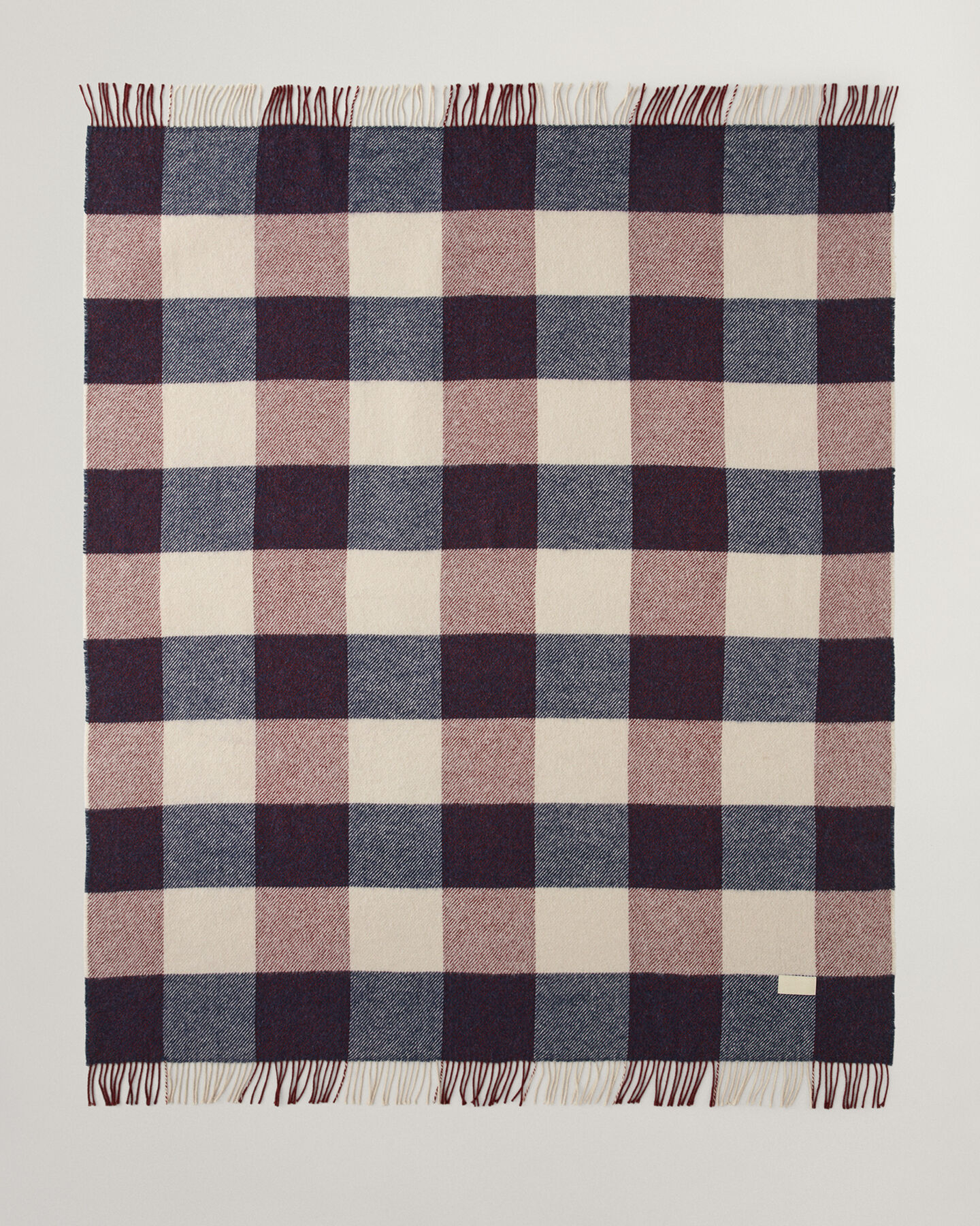 Manta decorativa com padrão de xadrez