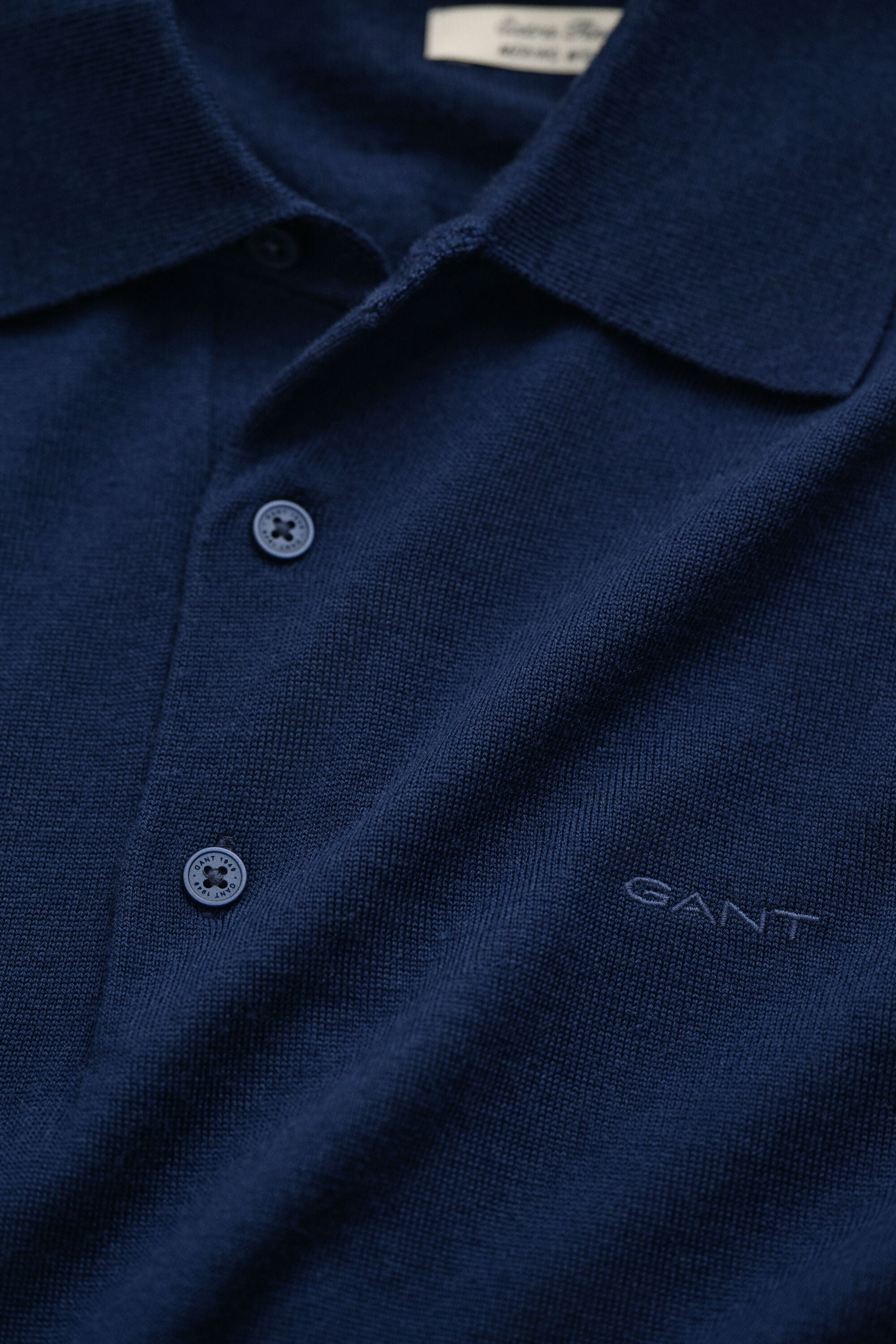 Camisola de malha estilo polo em lã de merino extrafina