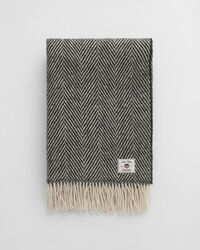 Manta decorativa em lã com padrão espinha de peixe