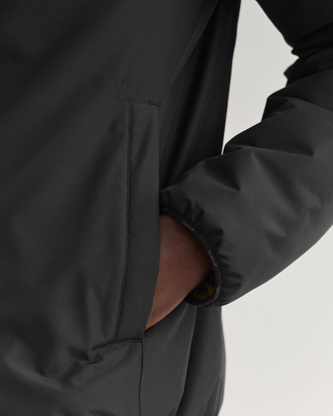 Casaco com capuz revers&iacute;vel