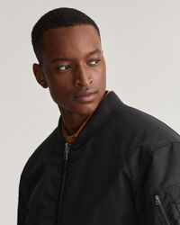 Casaco bomber reversível