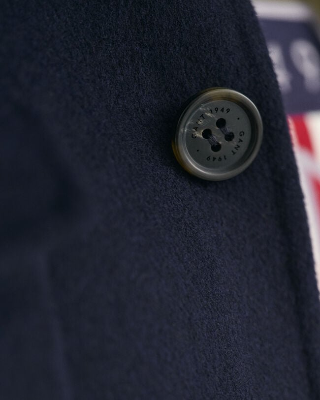 Casaco cosido à mão com 4 bolsos