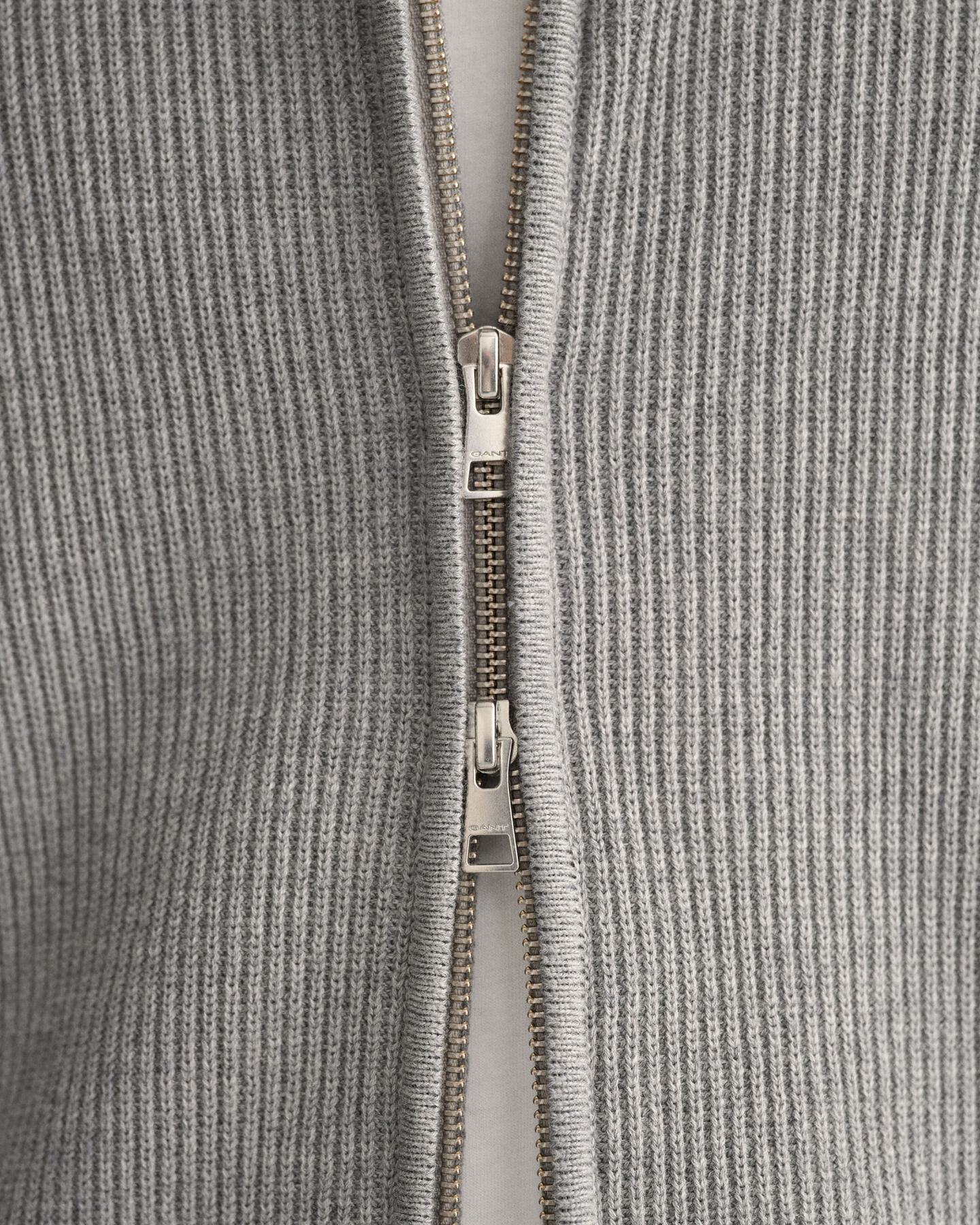 Casaco em malha canelada com fecho Texture