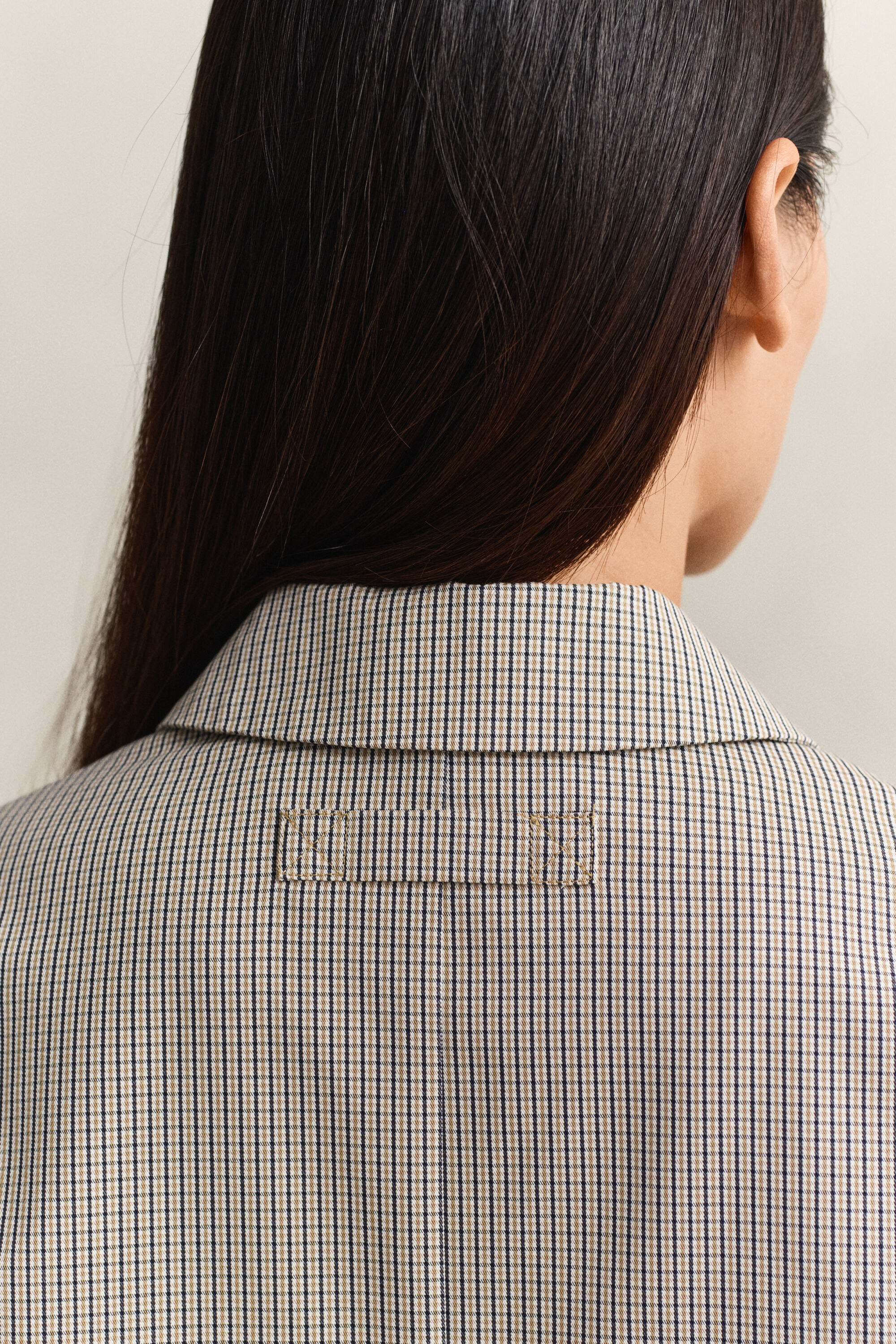 Gabardina com padrão de xadrez