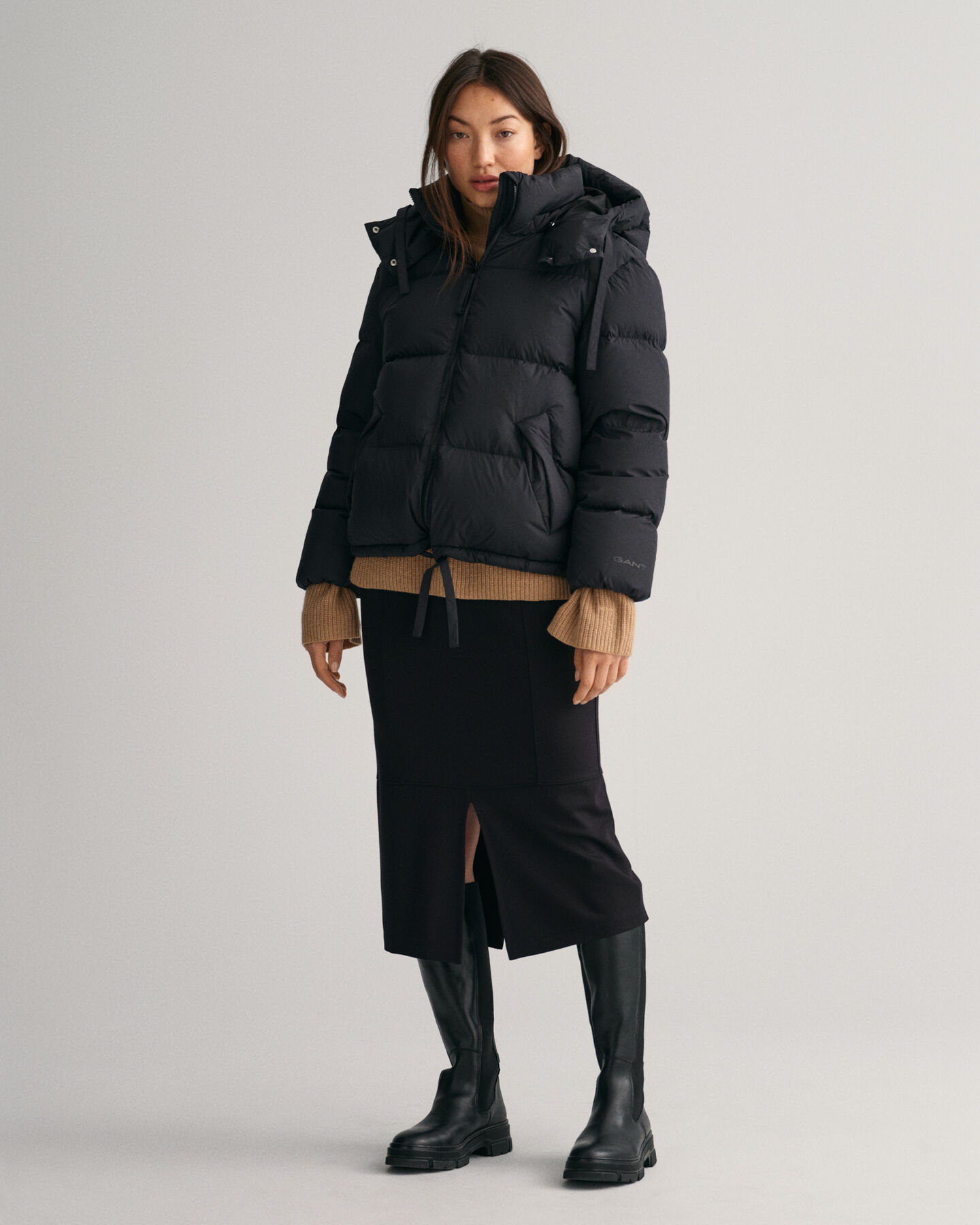 Blus&atilde;o de penas curto