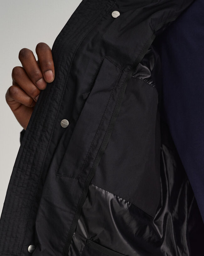 Blus&atilde;o de penas comprido Alta