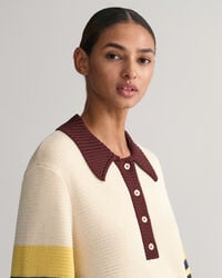 Polo em malha às riscas