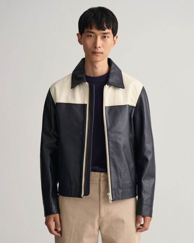 Blus&atilde;o em pele curto