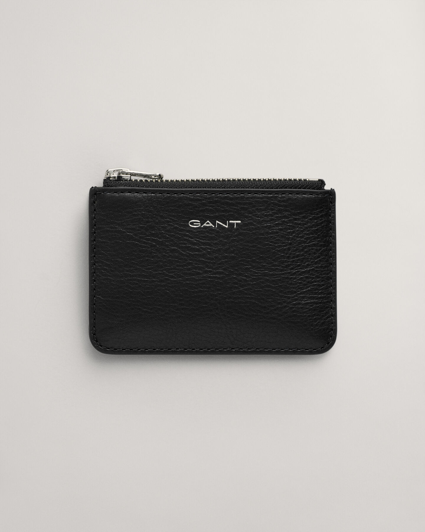 Bolsa em pele com fecho de correr