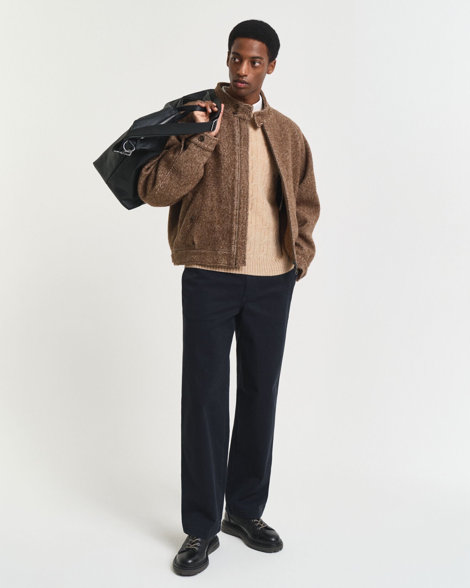 Camisola de malha entrançada de lã com decote redondo