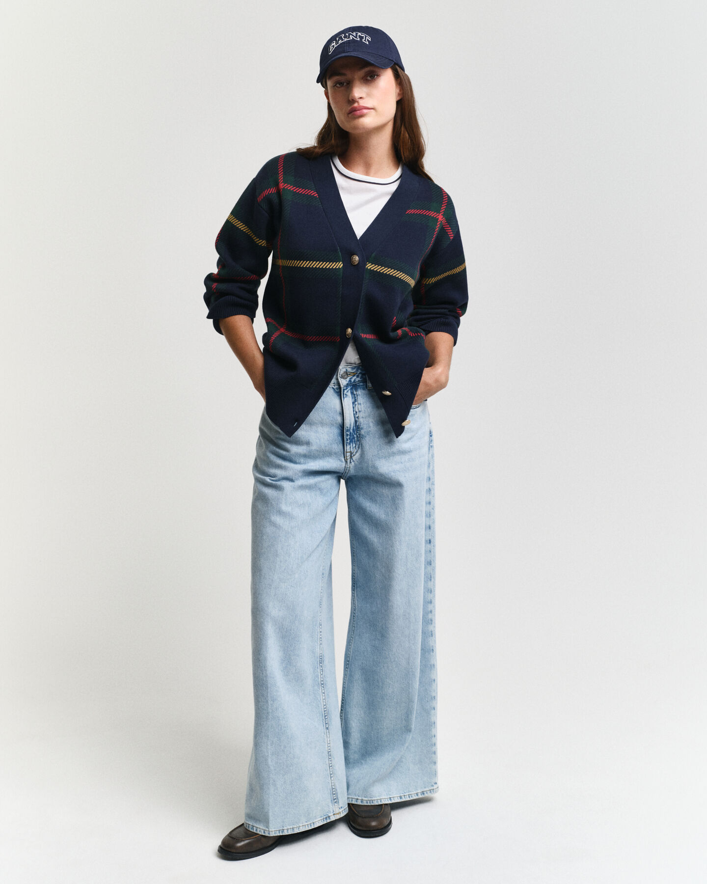 Casaco de malha com decote em V e padrão de xadrez