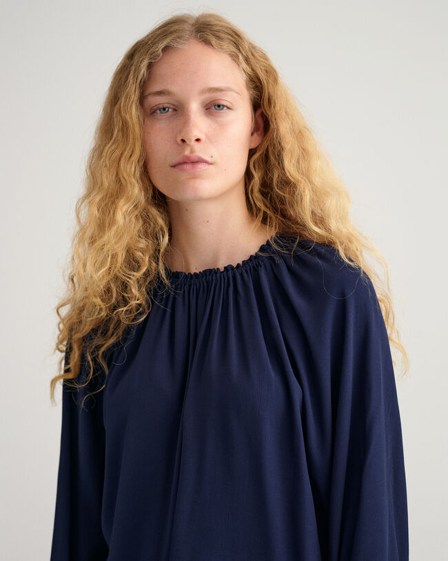 Blusa com decote à barco