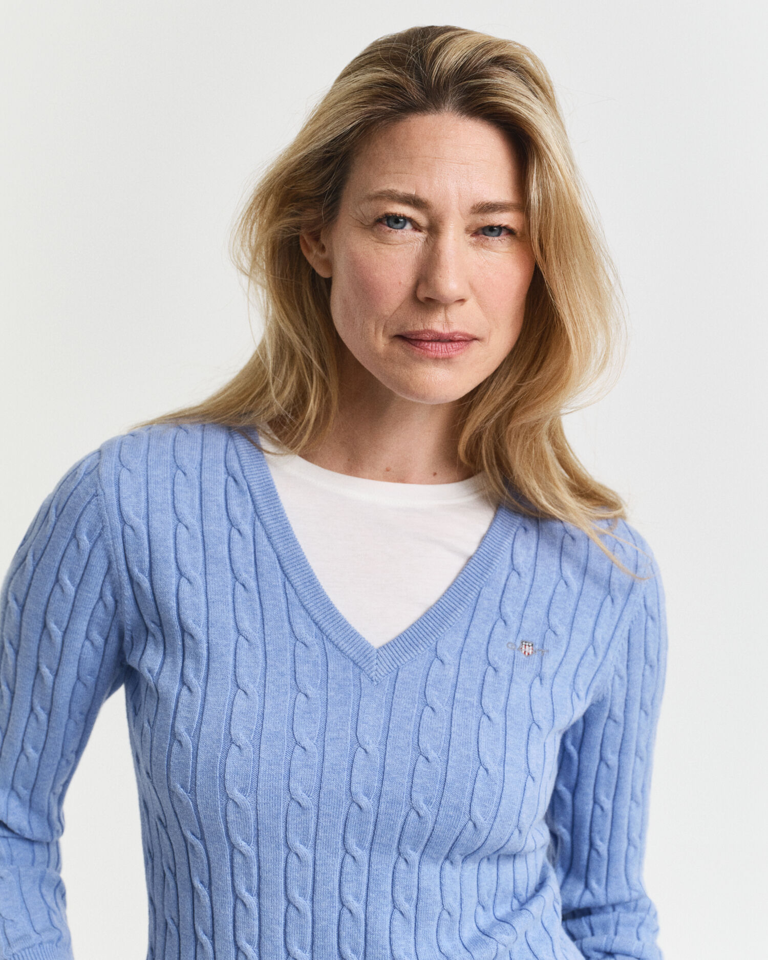 Pullover com decote em V em malha entrançada