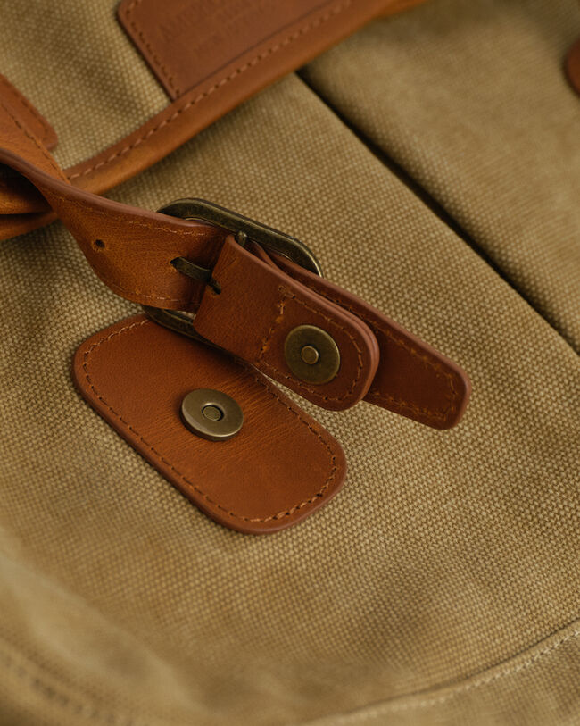 Mala em lona com efeito desgastado