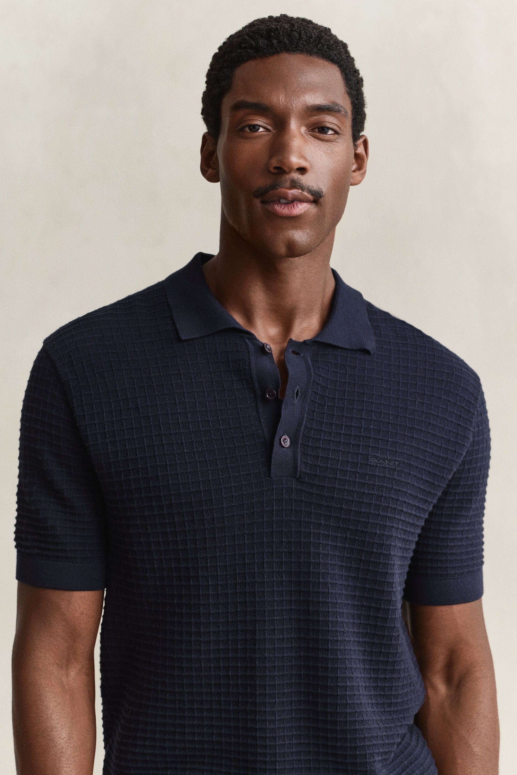 Camisola de malha texturizada tipo polo