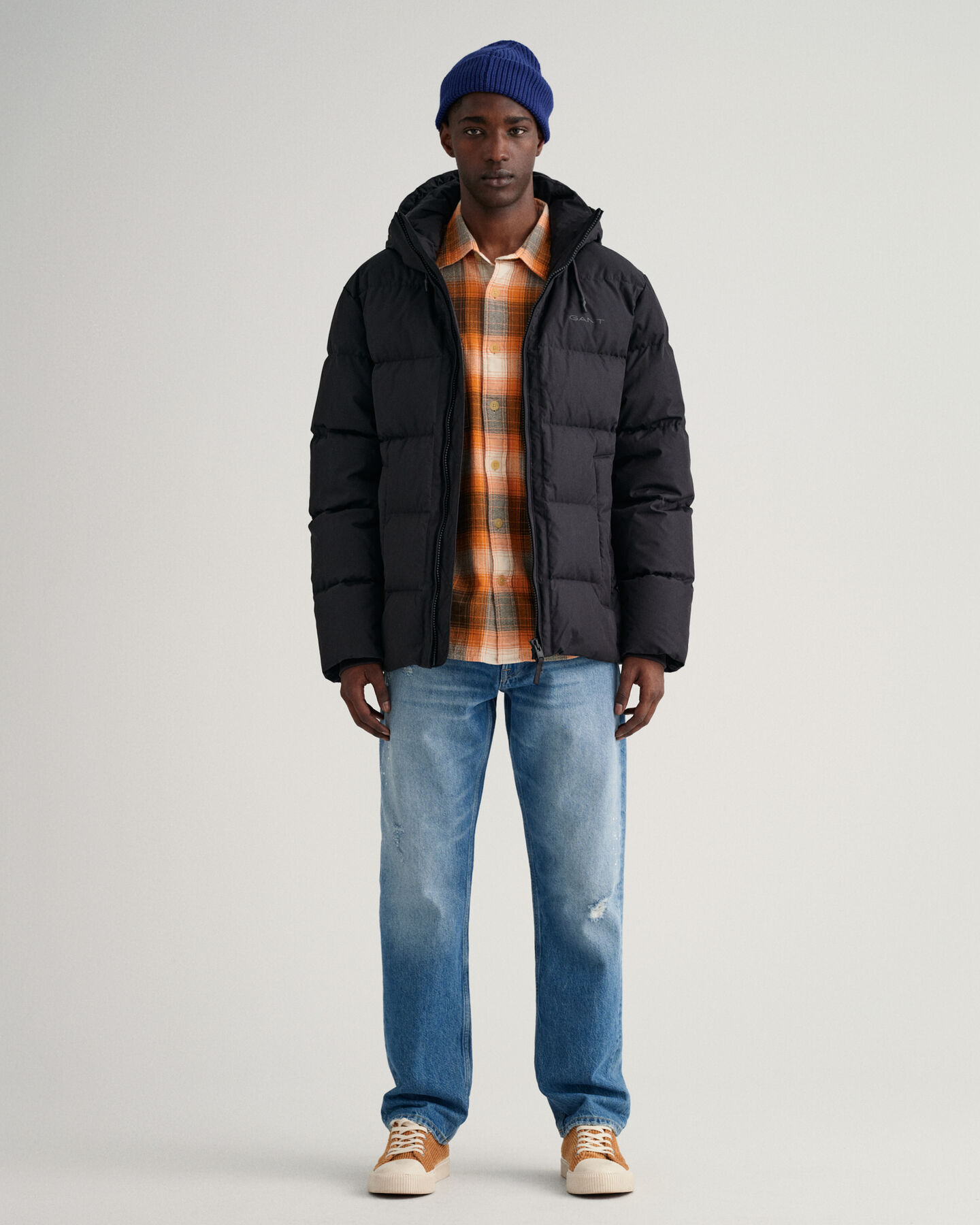 Blus&atilde;o de penas Alta