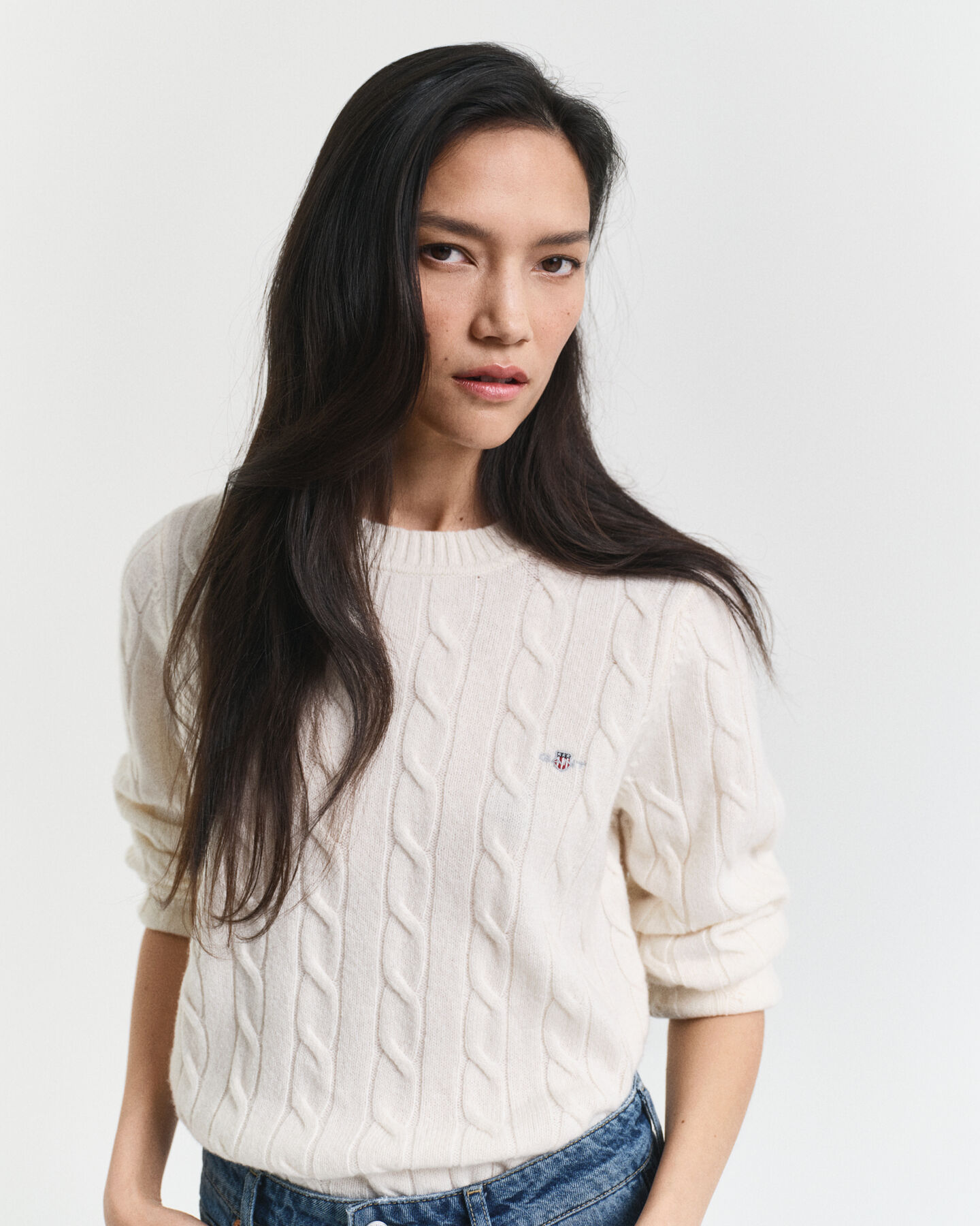 Camisola de malha entrançada de lã com decote redondo