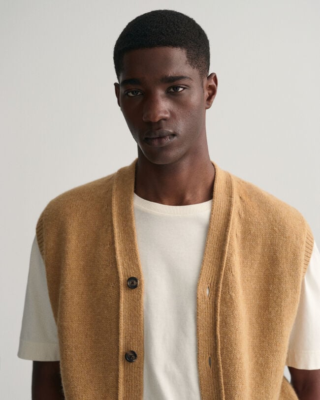 Colete com botões em lã suave