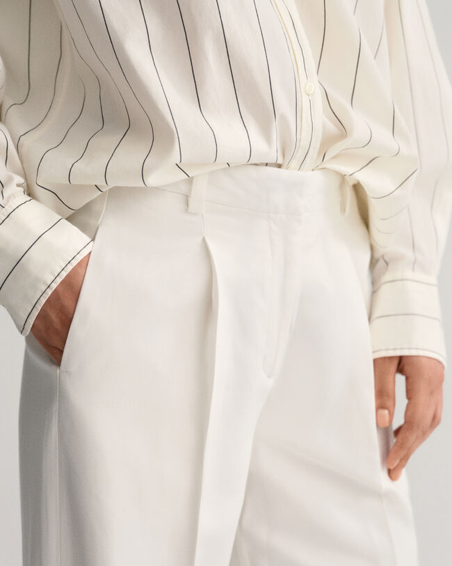 Calças com pregas relaxed fit