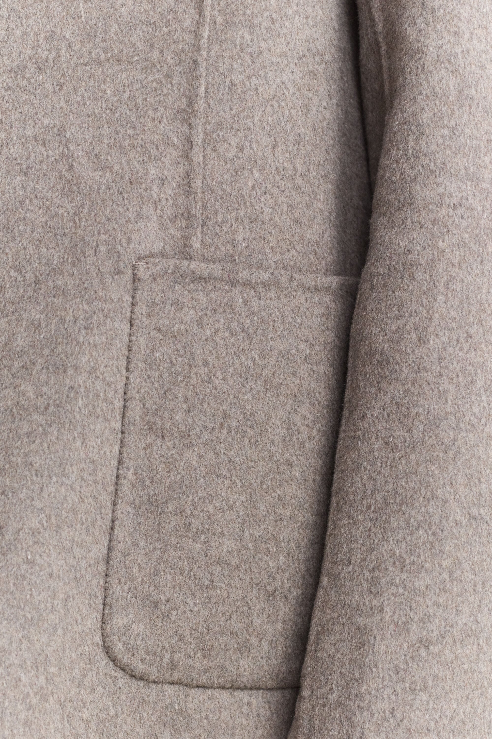 Blazer cosido à mão