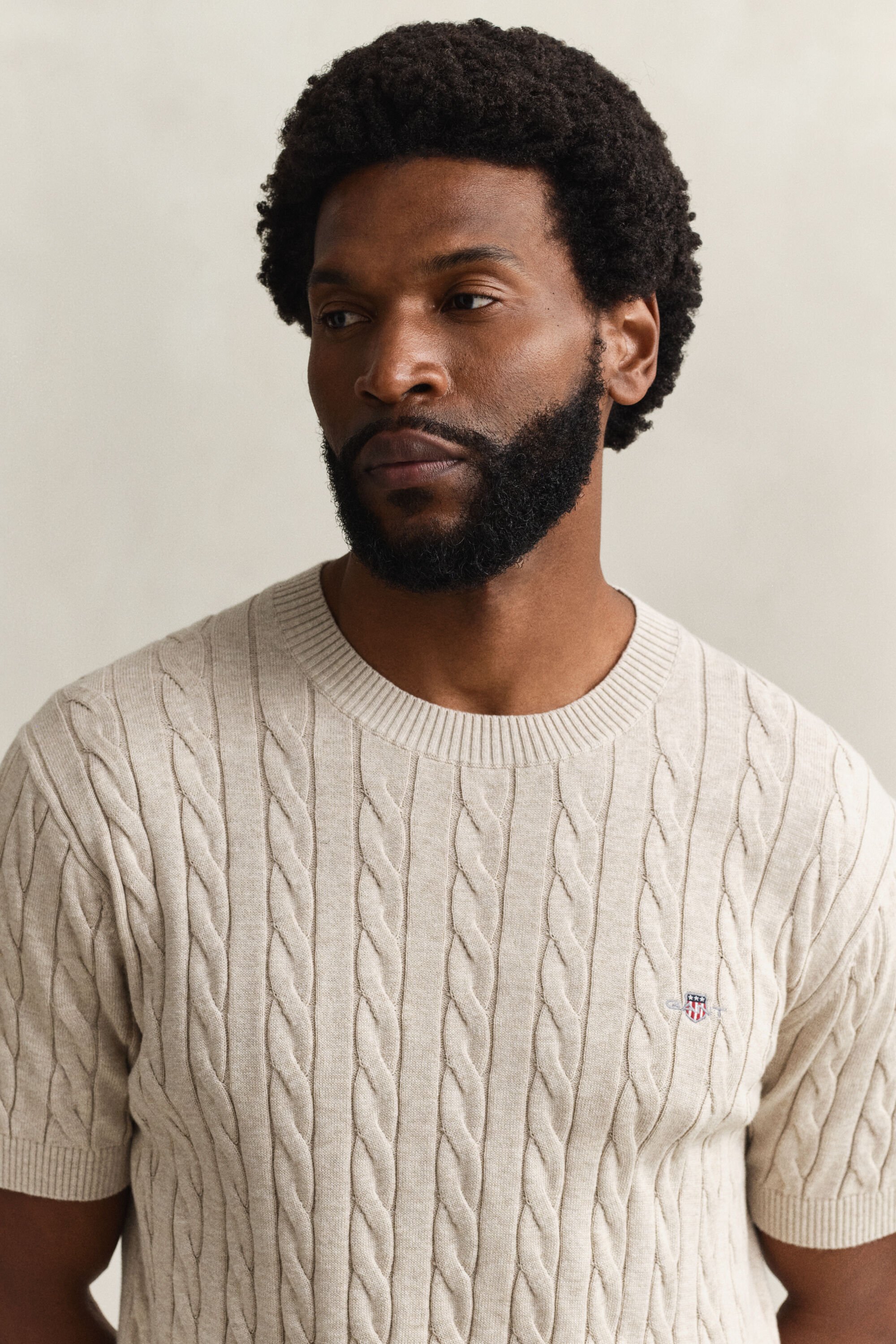 Camisola de manga curta em malha entrançada de algodão