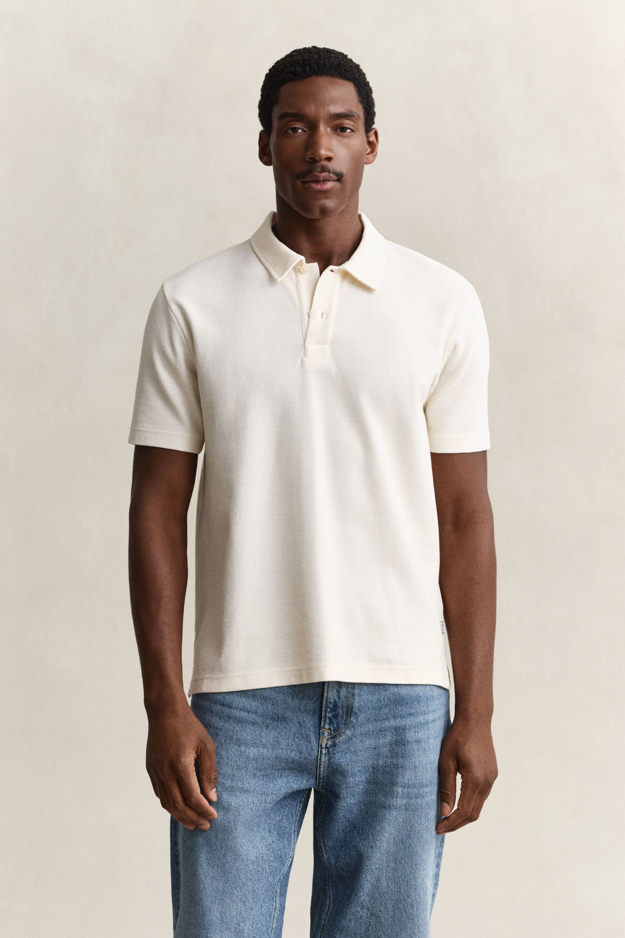 Polo com textura waffle