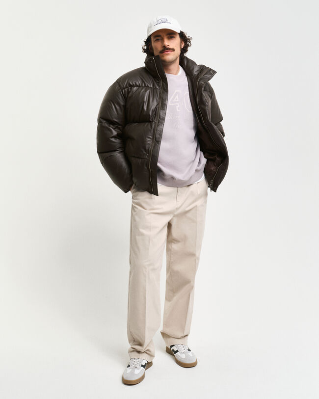 Blusão acolchoado em pele com penas de ganso