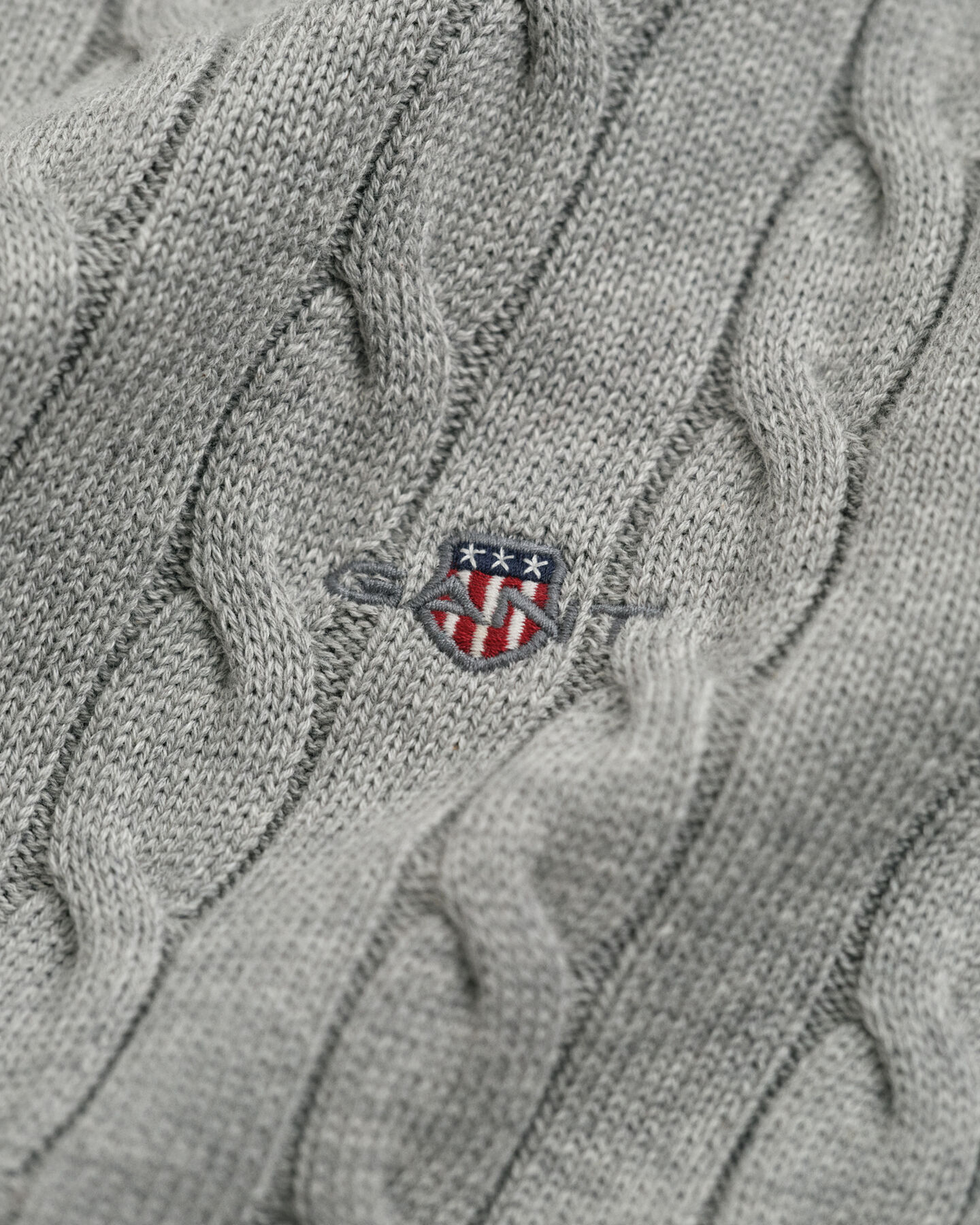 Camisola de gola alta em malha entrançada de algodão